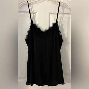 NWOT never worn black cami with beautiful trim